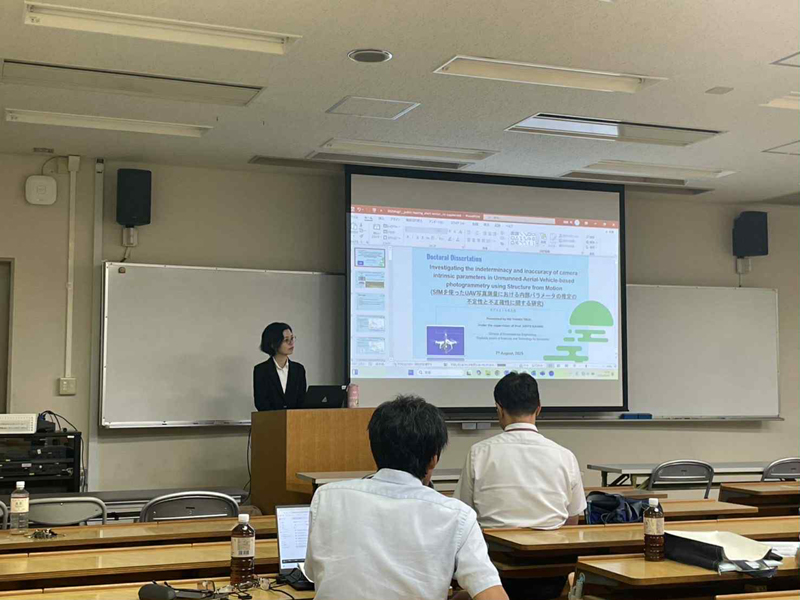 A person standing in front of a screenAI-generated content may be incorrect.