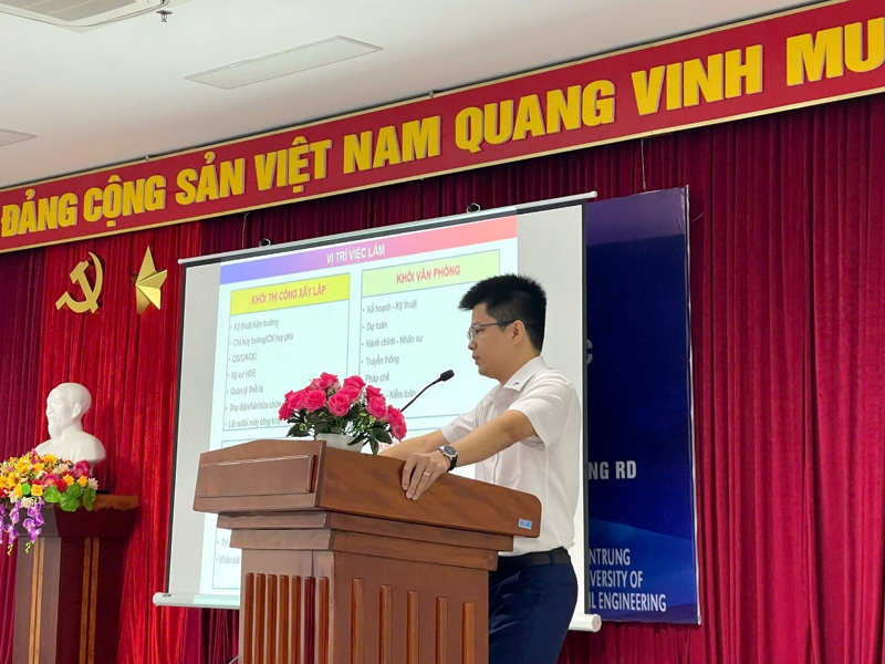 A person standing at a podiumDescription automatically generated